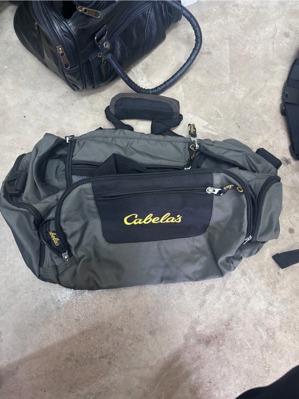 Cabela's Gray and Black Men's Duffel Bag with Yellow Logo